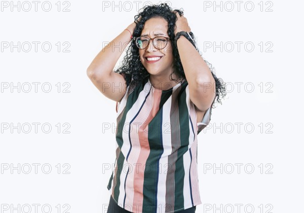 Overwhelmed young woman holding her forehead. Stressed and tired afro woman holding her head isolated