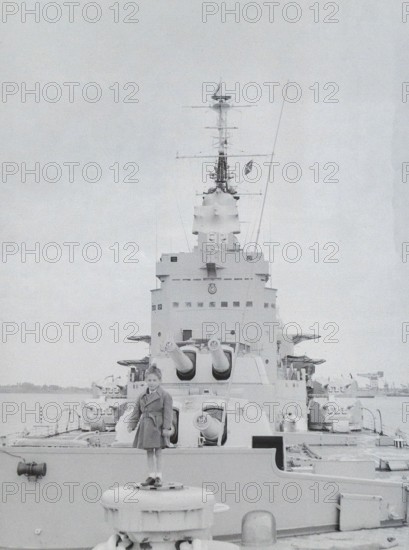 Boy on deck of Royal Navy HMS Vanguard battleship, Devonport, Plymouth, Devon, England, UK c 1956