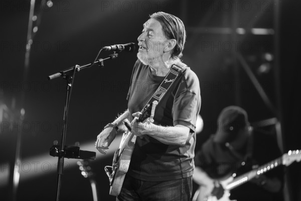 Chris Rea, singer and guitarist Christopher Anton Chris Rea live on Road Songs for Lovers tour at Berlin's Tempodrom on 30.10.2017. Note: the photo was later converted to b/w