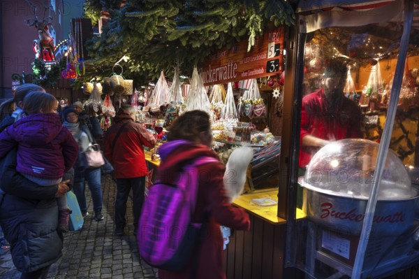 Cotton candy at a candy stand at the Christmas market for children in Nuremberg, Middle Franconia, Bavaria, Germany