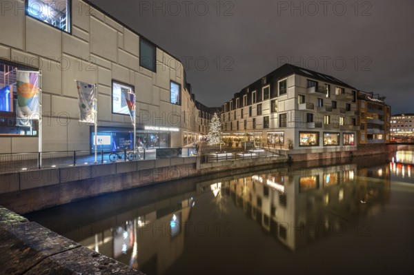 Evening view across the Pegnitz to the new Augustinerhof with museum of the future, Nuremberg Middle Franconia, Bavaria, Germany
