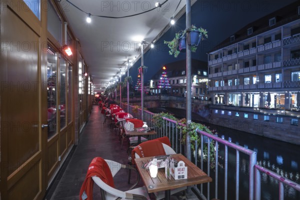 Restaurant with outdoor tables at Pegnitz am Abend, Nuremberg, Middle Franconia, Bavaria, Germany