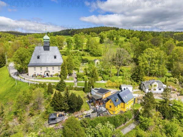 Aerial view, drone photo: Oberneuschönberg mountain church, surrounded by houses and trees, Olbernhau, Ore Mountains, Saxony, Germany