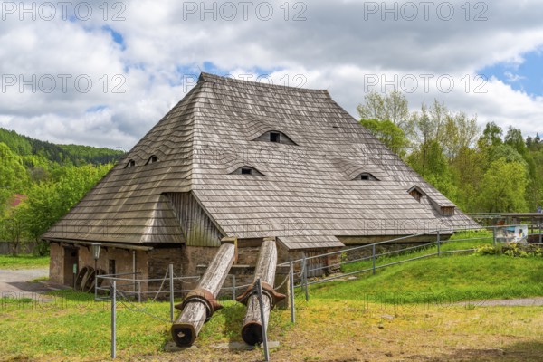 Historic copper hammer mill in a historic house with shingle roof, Museum Saigerhütte Grünthal, Olbernhau, Ore Mountains, Saxony, Germany