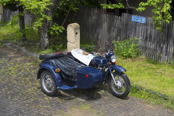 Blue motorcycle with sidecar parked on a cobblestone road, motorcycle team, model of the Ukrainian brand Dnepr, Asureti, Elizabeth Valley, Lower Kartli region, Georgia