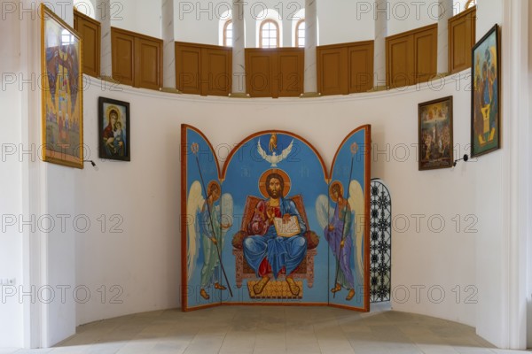 Iconostasis with central image of Christ and angels. Bright church surrounded by religious paintings, German Evangelical Lutheran Church of the Redeemer, Schwabenstraße, village founded by Caucasian Germans, Asureti, Asureti, Elizabeth Valley, Lower Kartli region, Georgia
