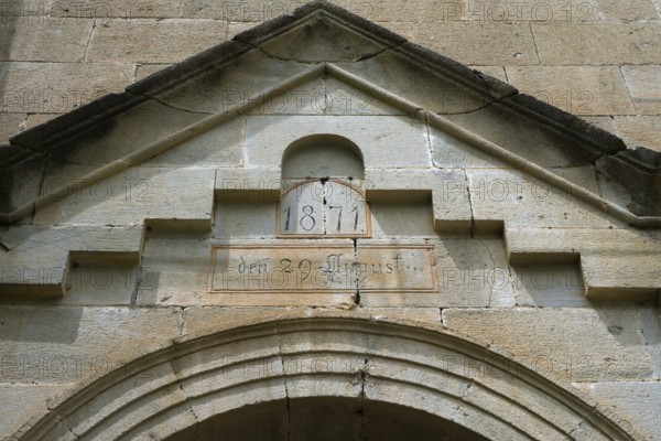 Historic stone structure with inscription and pediment from 1871, German Evangelical Lutheran Church of the Redeemer, Schwabenstraße, village founded by Caucasian Germans, Assureti, Elizabeth Valley, Lower Kartli region, Georgia