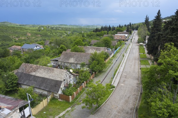 A quiet village with hills, wooded roads and scattered houses, view from the German Evangelical Lutheran Church of the Redeemer, Schwabenstraße, village founded by Caucasian Germans, Assureti, Asureti, Elizabeth Valley, Lower Kartli region, Georgia
