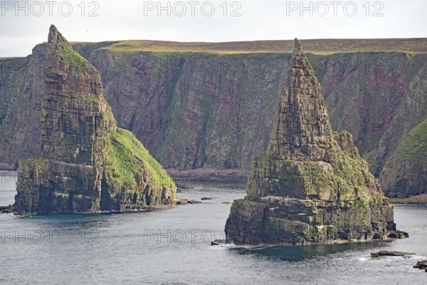 Impressive rock formations on a stormy coastline, Duncansby Stacks, John O' Groats Scotland, Great Britain