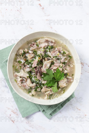Muzhuzhi, a Georgian dish made from pork legs, with spices and herbs, homemade