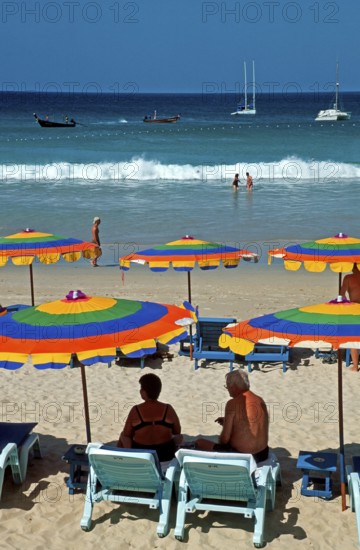 People, umbrellas, boats, Kata Beach, two years in front of the tsunami, Ko Phuket, Thailand, December 2002, vintage, retro, old, historic
