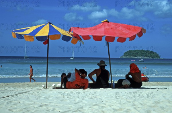 People, umbrellas, island, Kata Beach, two years in front of the tsunami, Ko Phuket, Thailand, December 2002, vintage, retro, old, historic