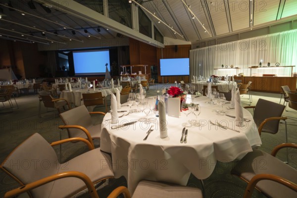 An empty function room with a closed presentation and festive decor, Christmas party Dekra Congresshotel Wart, Calw district, Germany