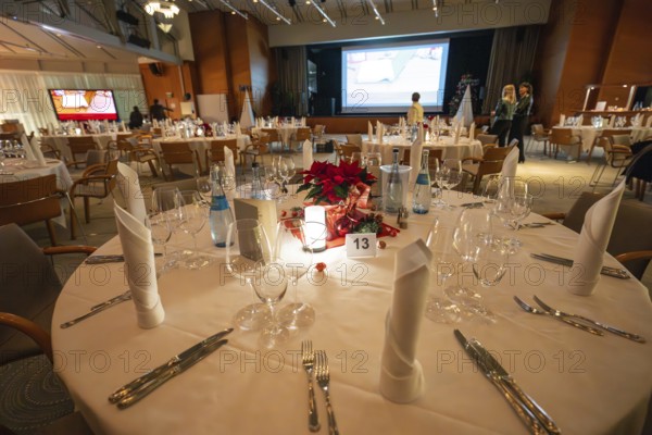 A festively decorated table with Christmas decoration and elegant lighting, Christmas party Dekra Congresshotel Wart, Calw district, Germany