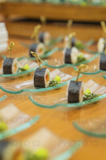Small sushi appetizers artfully arranged on glass plates ready for reception, Christmas party Dekra Congresshotel Wart, Calw district, Germany