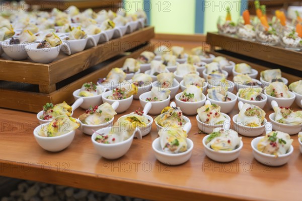 Bowls with delicious starters and colorful side dishes presented decoratively, Christmas party Dekra Congresshotel Wart, Calw district, Germany