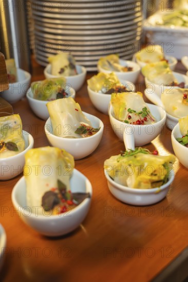Warm dim sum in small bowls, garnished with spices, Christmas party Dekra Congresshotel Wart, Calw district, Germany
