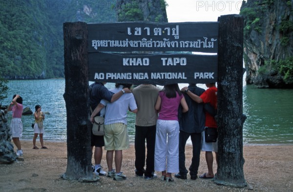 Tourists taking selfie, James Bond rocks, James Bond Island, two years in front of the tsunami, Phangnga Bay, Ko Phuket, Thailand, December 2002, vintage, retro, old, historic