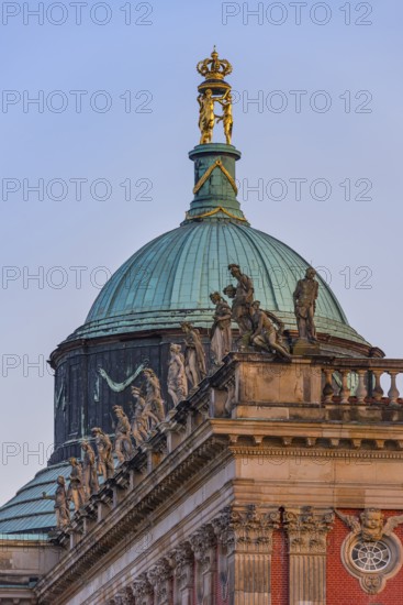 Figures and statues at the new palace in Sanssouci Park in the evening light, Potsdam