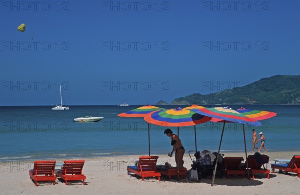 Paragliders, umbrellas, boats, people, Patong Beach, Ko Phuket, two years in front of the tsunami, Thailand, December 2002, vintage, retro, old, historic