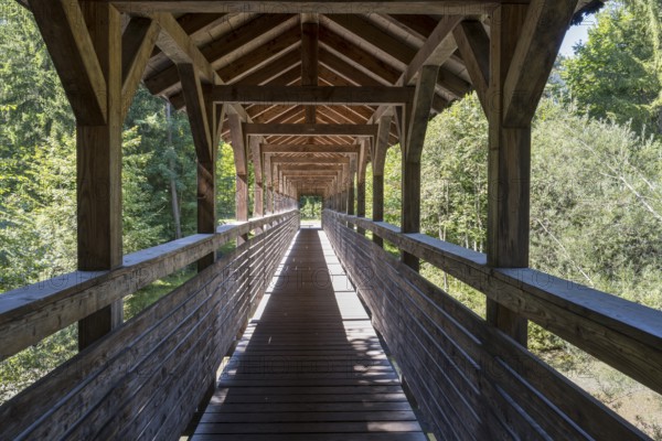 Covered wooden bridge over the Weissach river, Kreuth, Tegernseer Tal, Upper Bavaria, Bavaria, Germany