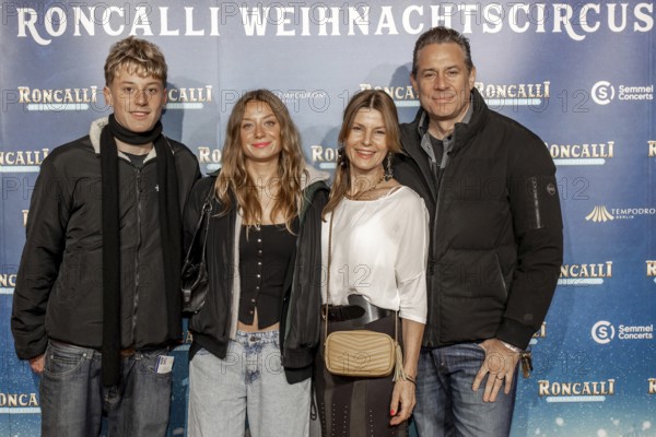 Sascha Vollmer (The BossHoss) with his woman Jennifer Vollmer and their children Johnny and Manischa at the premiere of the 21st Original Roncalli Weihnachtscircus Berlin at the Tempodrom in Berlin on 19 December 2025