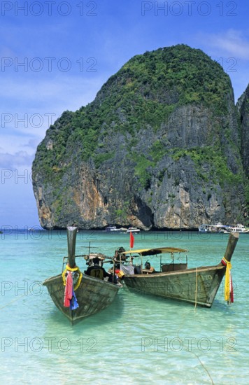 Longtail boats on Maya Bay beach, known from the movie The Beach, one year in front of the tsunami, Ko Phi Phi Le, Thailand, December 2002, vintage, retro, old, historic