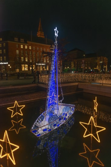 Christmas decoration in Kiel am Holstenfleet, Kleiner Kiel Canal, city center, Christmas, lighting, lights, sailboats, stars, water reflection, town hall tower, evening, darkness, Germany