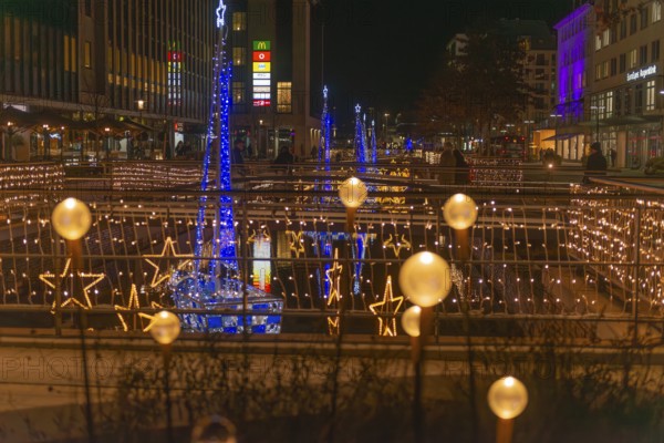 Christmas decoration in Kiel am Holstenfleet, Kleiner Kiel Canal, city center, Christmas, lighting, lights, sailboats, stars, water reflection, shops, bridge, evening, darkness, Germany