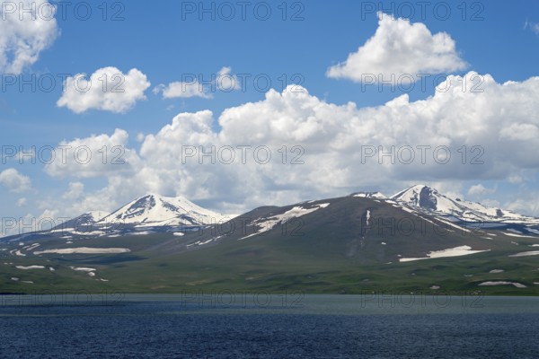 Majestic snow-capped mountains above a deep blue lake, Lake Parawani, Samtskhe—Javakheti Highlands, Samtskhe-Javakheti, Lesser Caucasus, Georgia