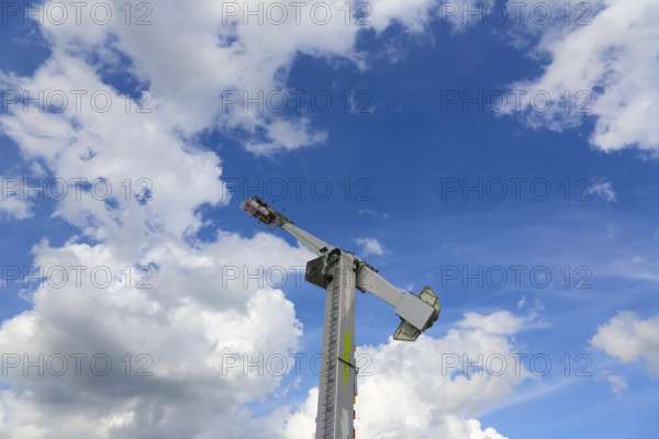No limit carousel, fairground in Friedrichsau Ulm, folk festival, hustle and bustle, fair, amusement park, amusement attraction, ride, blue sky, clouds, Ulm, Baden-Württemberg, Germany