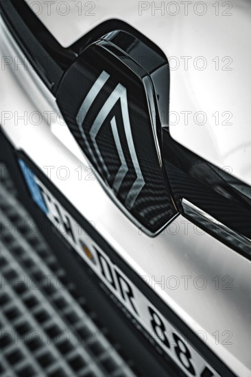 Close-up of the Renault logo on the hood of a car, Deer E- Carsharing, Renault Megane, Calw, Germany