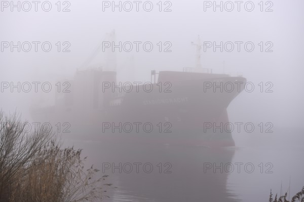 Freighter STADIONGRACHT in fog in the Kiel Canal, NOK, Kielkanal, Kielcanal, Schleswig-Holstein, Germany
