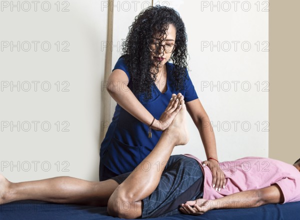 Physiotherapist with patient, Lumbar Physiotherapy. Physiotherapy rehabilitation concept