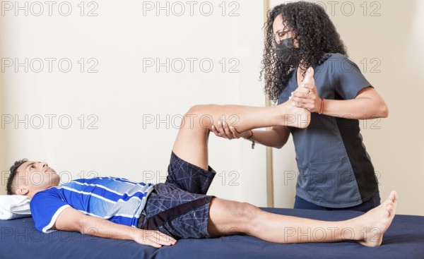 Physiotherapist checking patient leg. Orthopedic specialist helping a patient with a leg injury. physiotherapy treatment concept, Leg rehabilitation physiotherapy