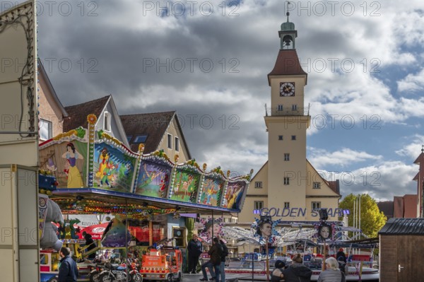 Children's carousel at the town festival on the market square, in the back the town hall, building from the 13th to 18th century, Unterer Markt, Hersbruck, Middle Franconia, Bavaria, Germany