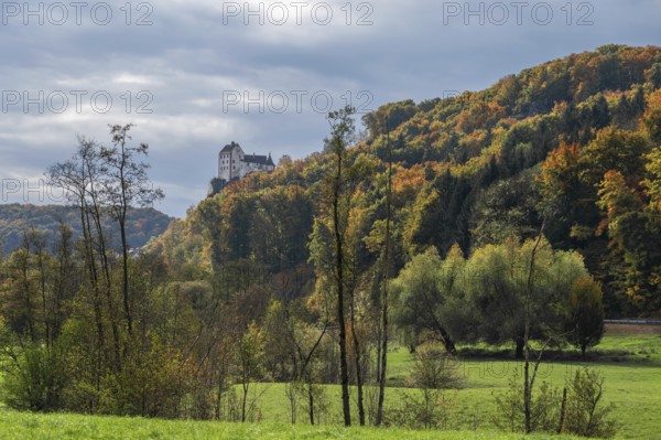 Egloffstein Castle with mixed autumn forest, Egloffstein, Upper Franconia, Bavaria, Germany