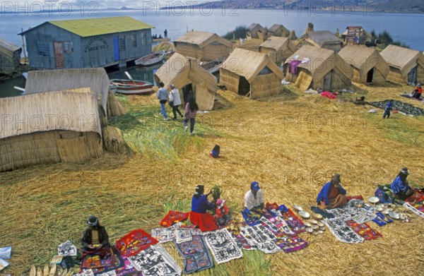 Sale of souvenirs, reed huts on a floating Uro island in Lake Titcaca, Andean highlands, Peru, South America, September 1997, vintage, vintage, historic