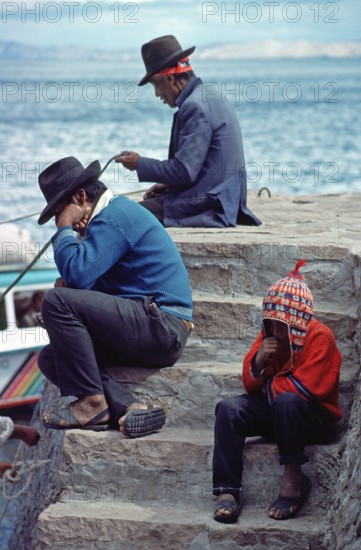 Men, boy, grandfather, father and son on Isla Taquile in Lake Titicaca, Andean Highlands, Peru, South America, September 1997, vintage, retro, old, historic