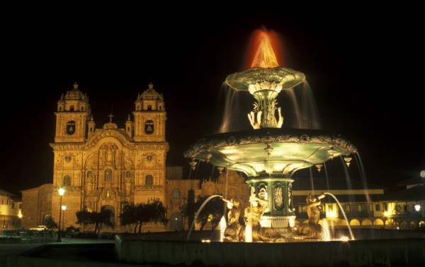 Illuminated fountain and cathedral on Placa de Armas, Cusco, Andean Highlands, South America, September 1997, vintage, retro, old, historic