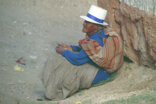 Old woman sitting on the side of the road, Cusco, Andean highlands, South America, September 1997, vintage, retro, old, historic
