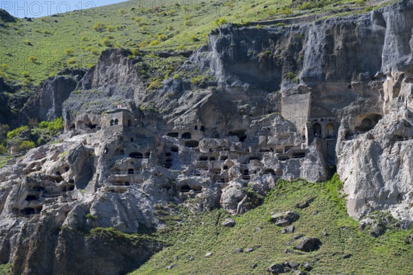 Impressive monastery complex nestled in a cliff. A mix of nature and history, cave town, cave monastery, Vardzia, Samtskhe—Javakheti region, Samtske Javacheti, Lesser Caucasus, Georgia
