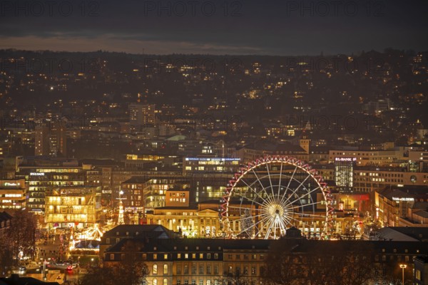 The view from above of the Stuttgart 2025 Christmas market shows a sea of festive lights and bustling stands that capture the city's winter atmosphere