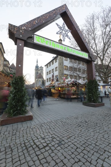 Entrance to Stuttgart 2025 Christmas Market: Festive lights, inviting stands, mulled wine, traditional treats and a lively atmosphere under magical light installations