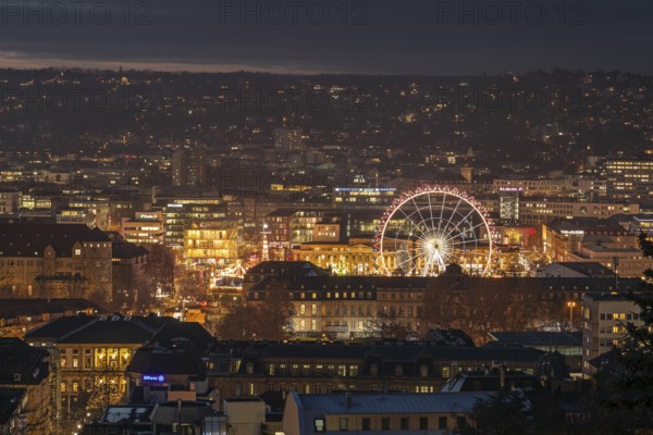 The view from above of the Stuttgart 2025 Christmas market with the Ferris wheel shows a sea of festive lights and bustling stands that capture the winter atmosphere of the city