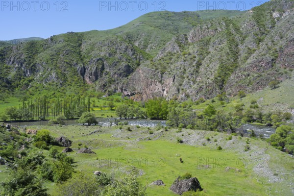 Green valley with agricultural environment and rolling hills. Scenic view, Kura River, Nakalakevi landscape, Samtskhe—Javakheti region, Samtske Javacheti, Lesser Caucasus, Georgia
