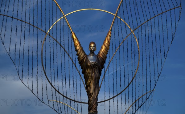 Golden angel, angel figure, angel motif, baroque Christmas market, evening light, Ludwigsburg, Baden-Württemberg, Germany