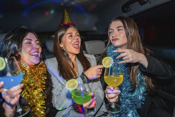 Three young women are happily celebrating a party in a car, enjoying colorful cocktails and good times under vibrant disco lights, creating a festive atmosphere