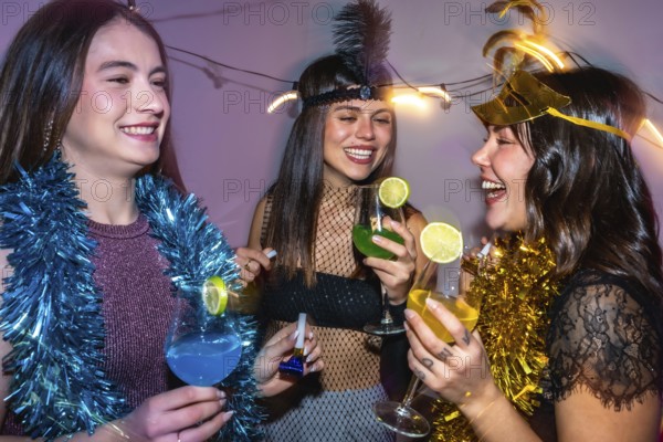 Diverse group of young women celebrating a new year's eve party or costume event, laughing and holding colorful cocktails, surrounded by festive decorations and dynamic lighting