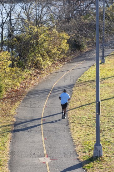 Washington, DC - A man jogs along the Annacostia Riverwalk Trail